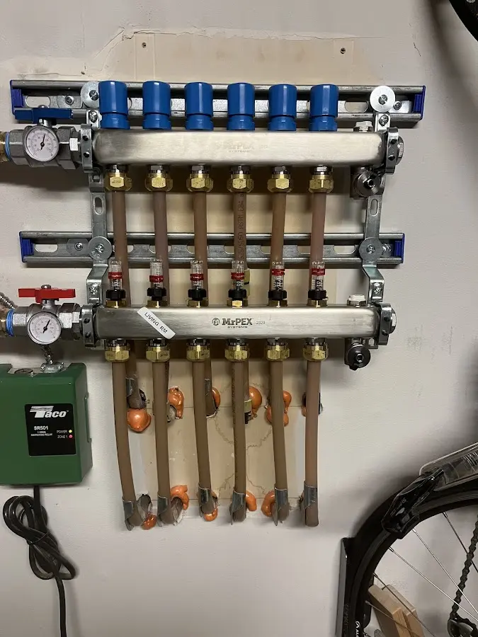 Plumber performing Leak Detection at a residential property in Chadds Ford